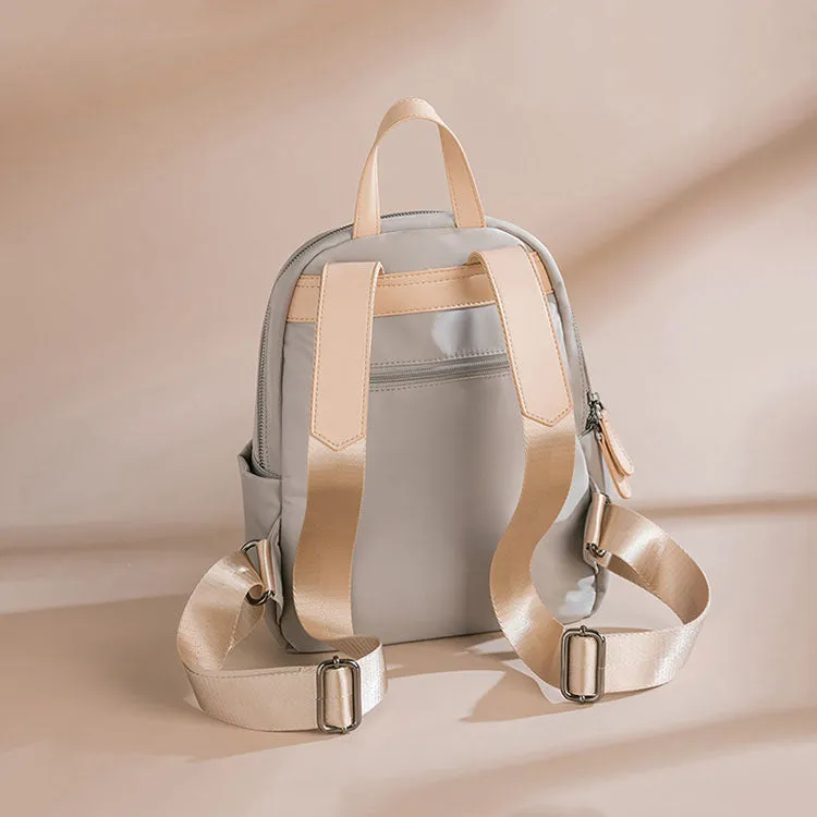 Sleek Minimalist Backpack in Elegant Light Gray – Smooth Finish with Practical Front Pocket and Adjustable Straps