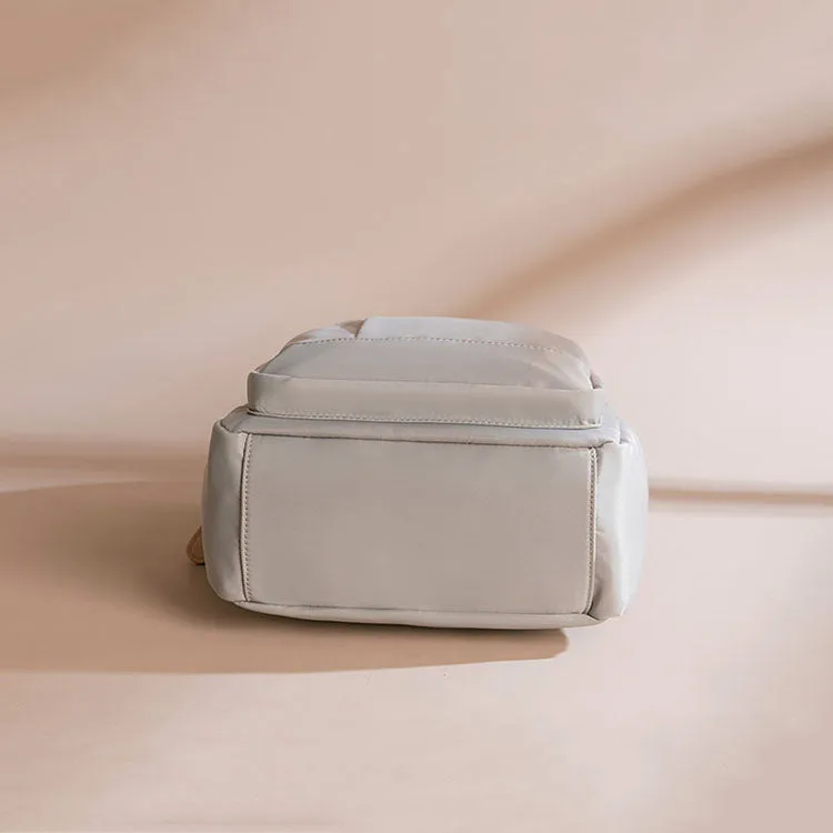 Sleek Minimalist Backpack in Elegant Light Gray – Smooth Finish with Practical Front Pocket and Adjustable Straps
