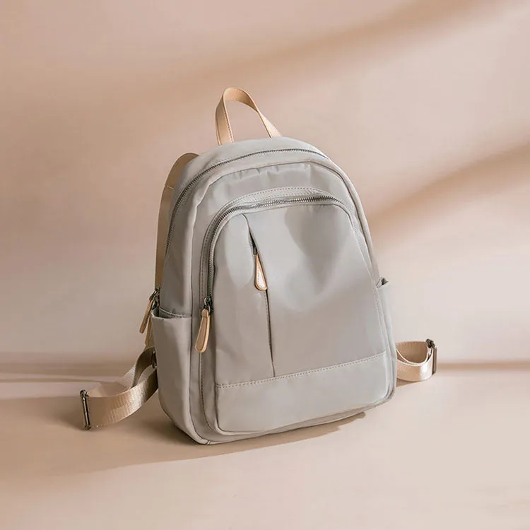Sleek Minimalist Backpack in Elegant Light Gray – Smooth Finish with Practical Front Pocket and Adjustable Straps